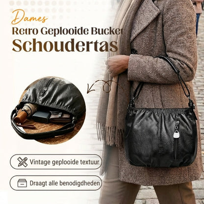 Ruime hobo schoudertas met geplooide structuur en ritsvak